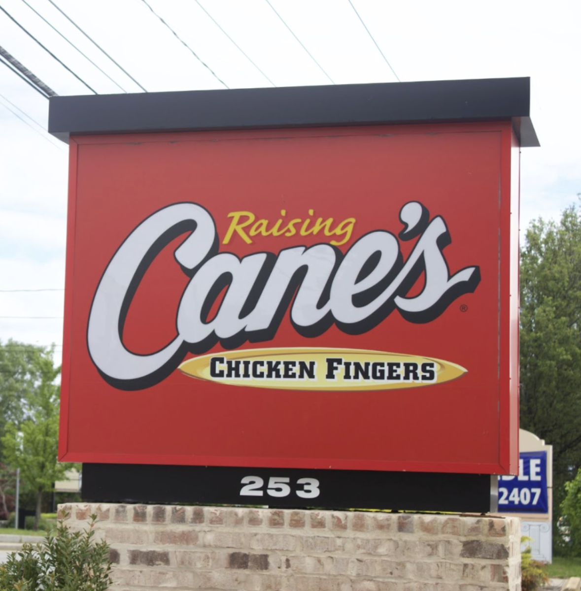 On Tuesday, May 20, the popular food chain Raising Cane’s opened its doors to the public at their new Framingham location. Eager customers, including Framingham residents, people from neighboring towns and several WHS students, rushed to 253 Cochituate Road throughout the day to get their hands on some crispy chicken. “I think the community at large is very excited [and] a lot of the people that work here are directly from the community,” Leader of Recruiting, Fry Cook and Cashier at Raising Cane's, Julio Polanco said. “Lots of energy, lots of questions and lots of curiosity leading to [opening day].”





